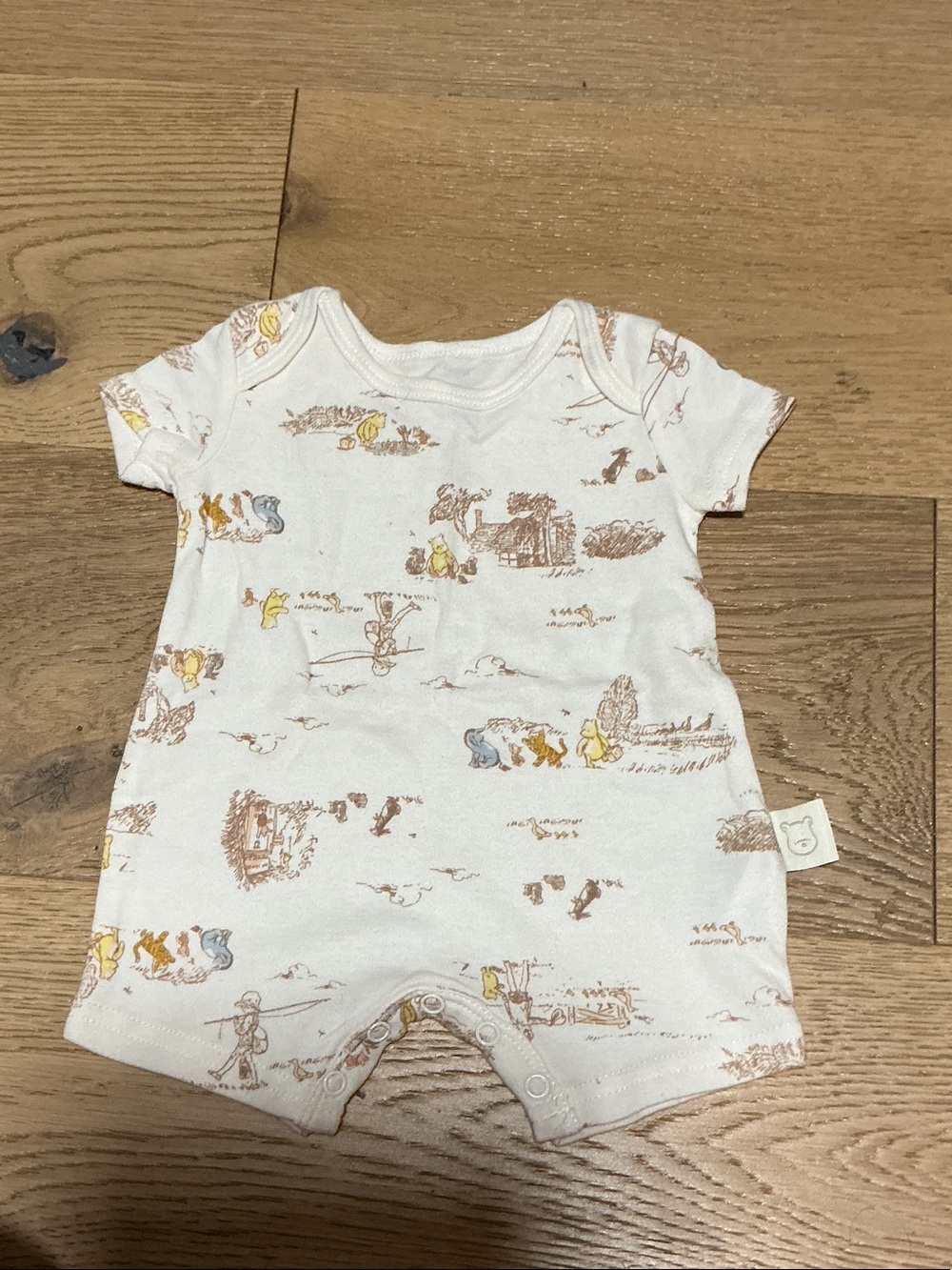 Target Cream One-Piece with Brown, Yellow, and Light Blue Character Print